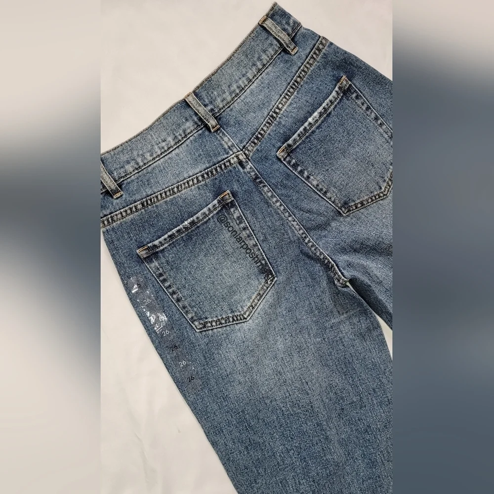 Women's Distressed Blue Jeans